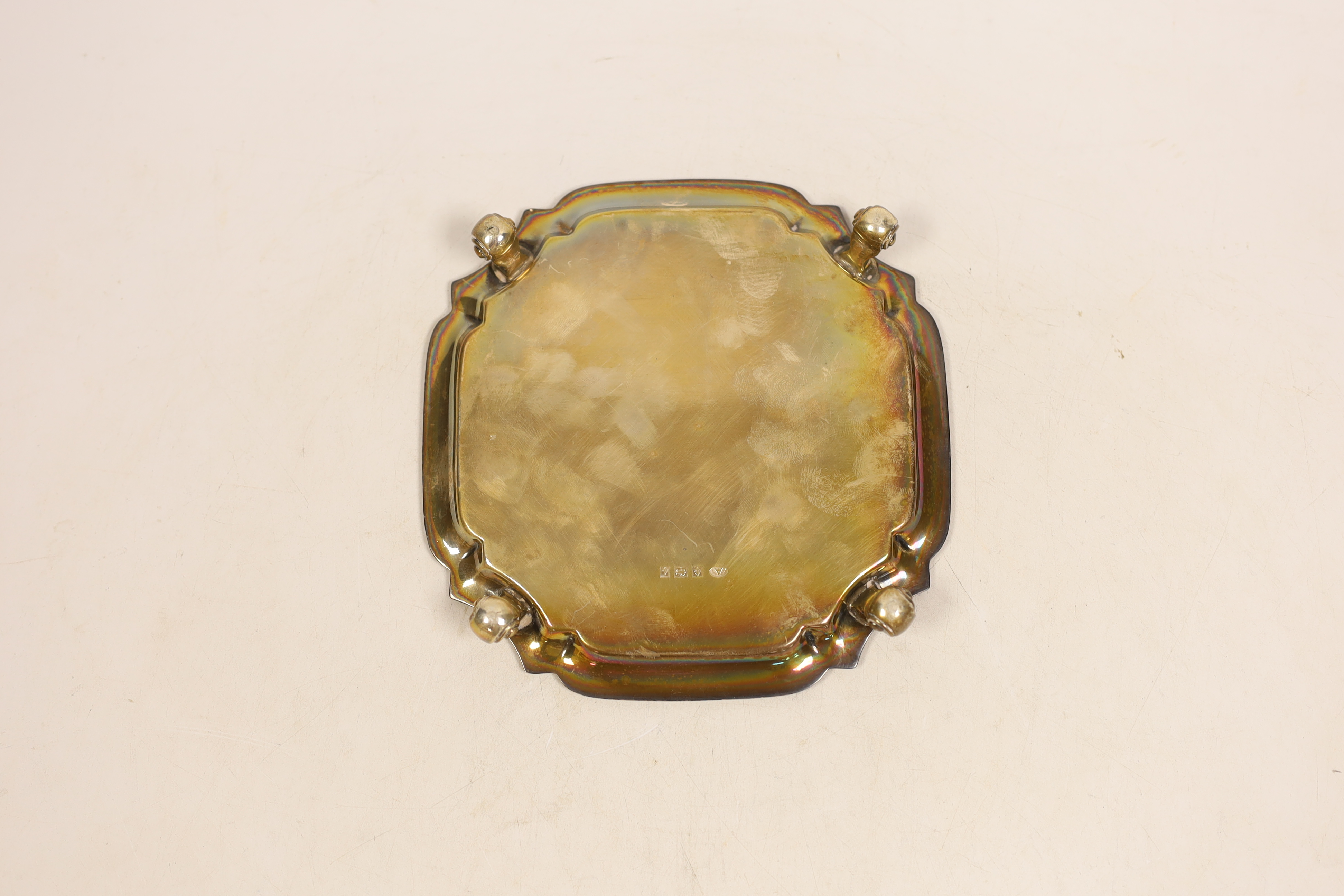 An Elizabeth II square shaped edge silver waiter on four scrolled feet, width 14.5cm, Adie Bros., Birmingham, 1960, 6.8oz.